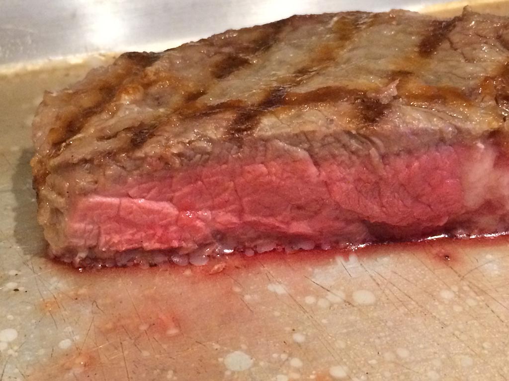 Bright pink interior of steak