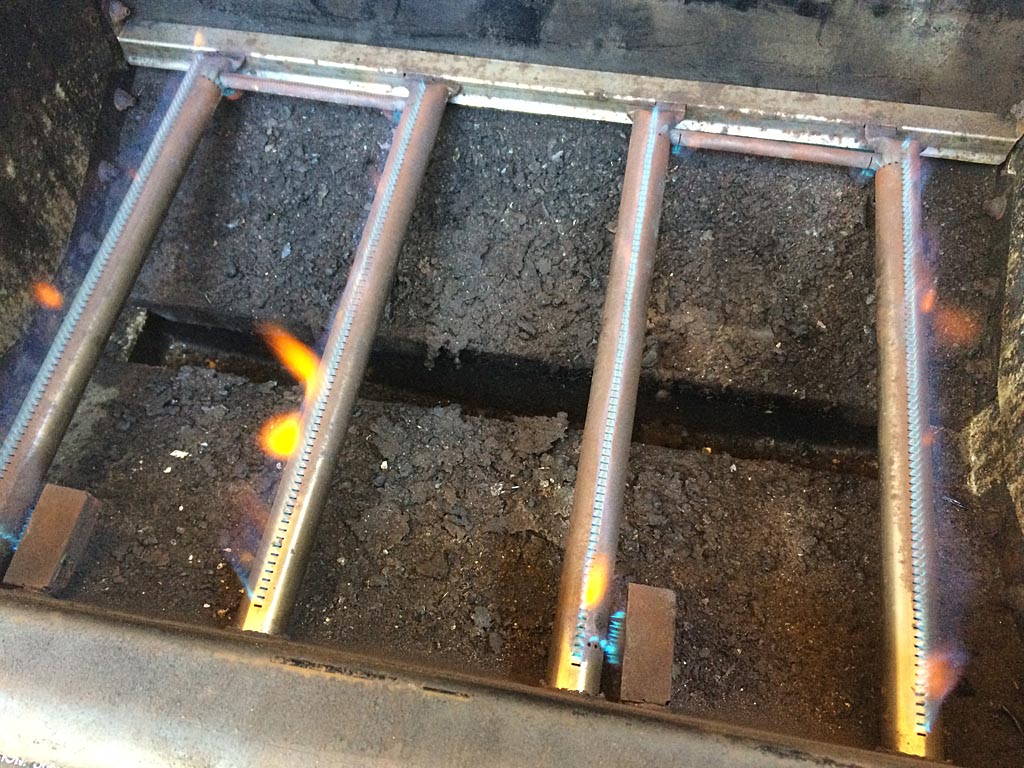 All burner tubes clean and burning with blue flames