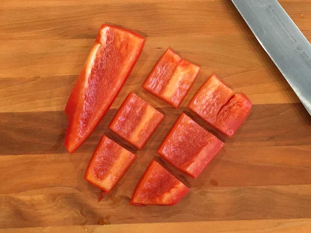 Cutting bell pepper into pieces