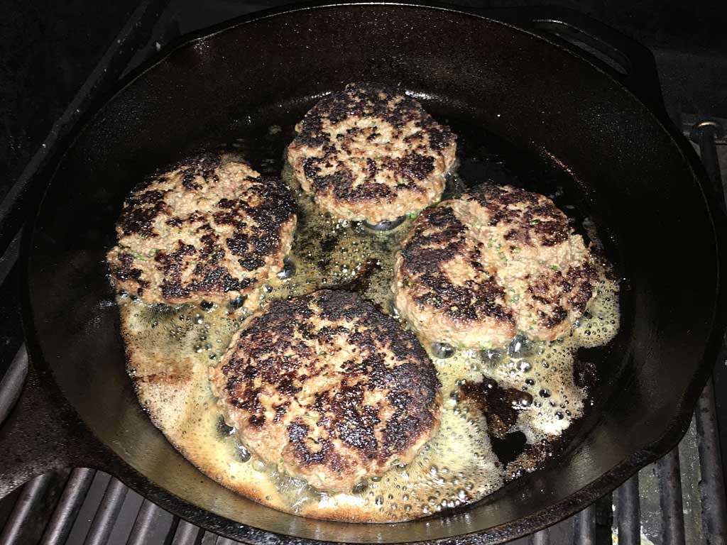 Searing burgers on the second side