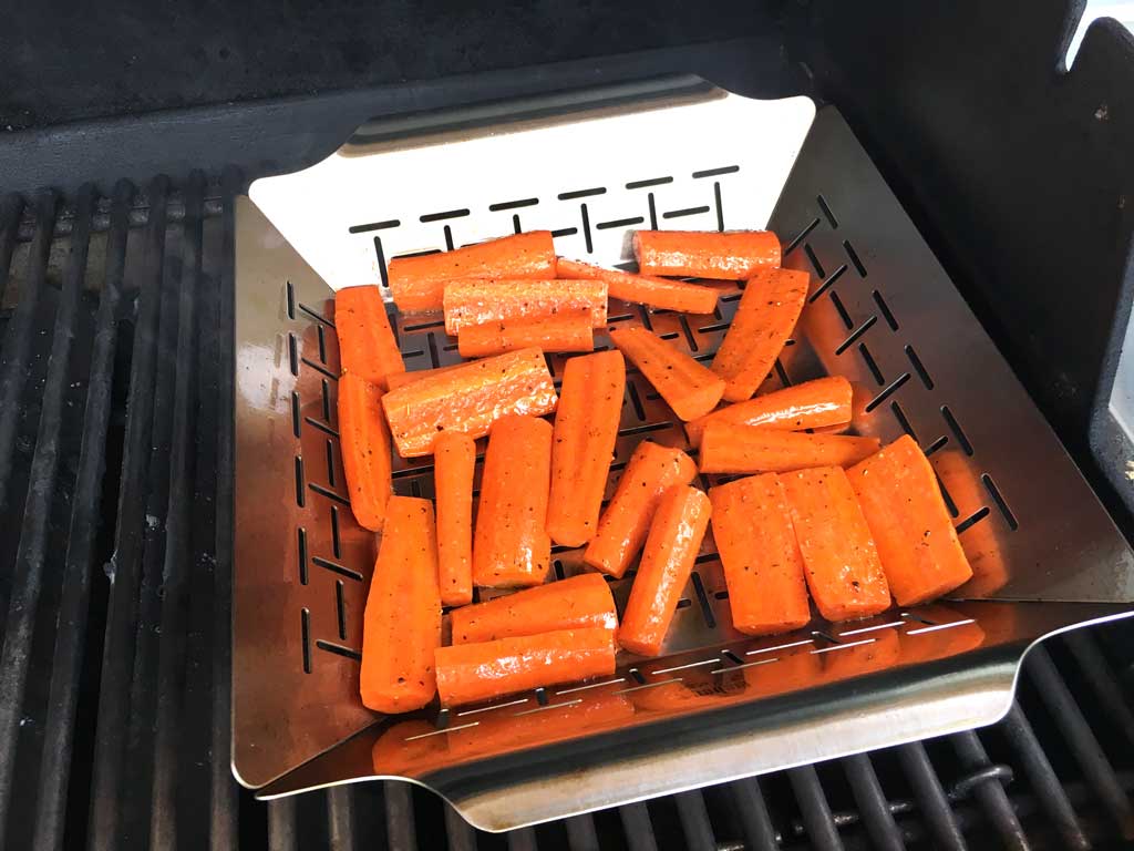 Carrots added to vegetable basket