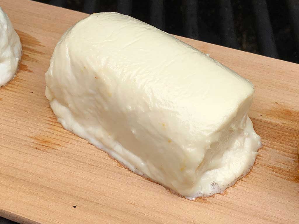 Warming goat cheese begins to slump