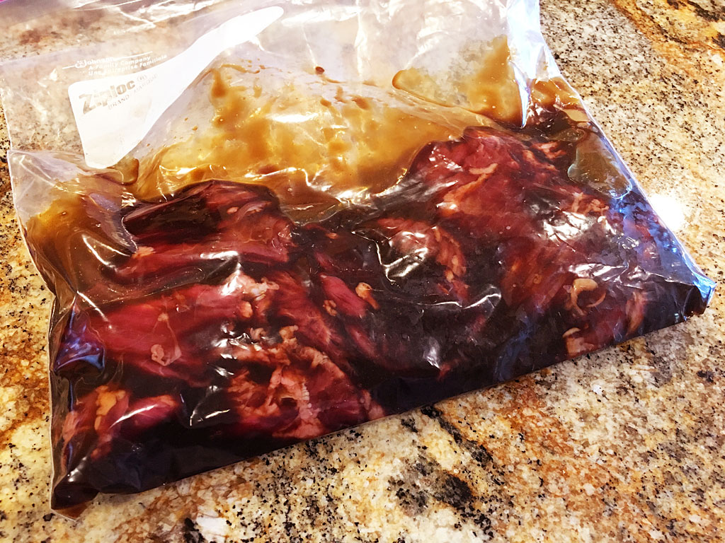 Sealing meat and marinade in Ziploc bag