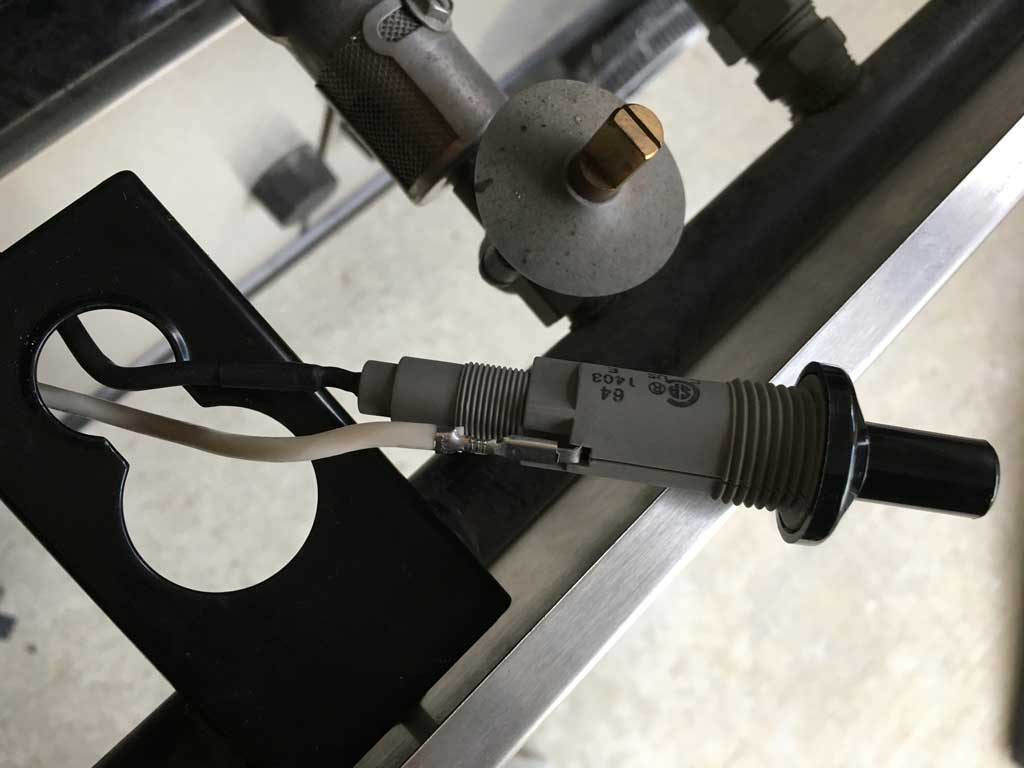 Connected wires on igniter button