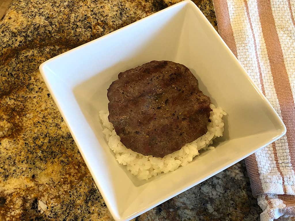 Burger on top of rice