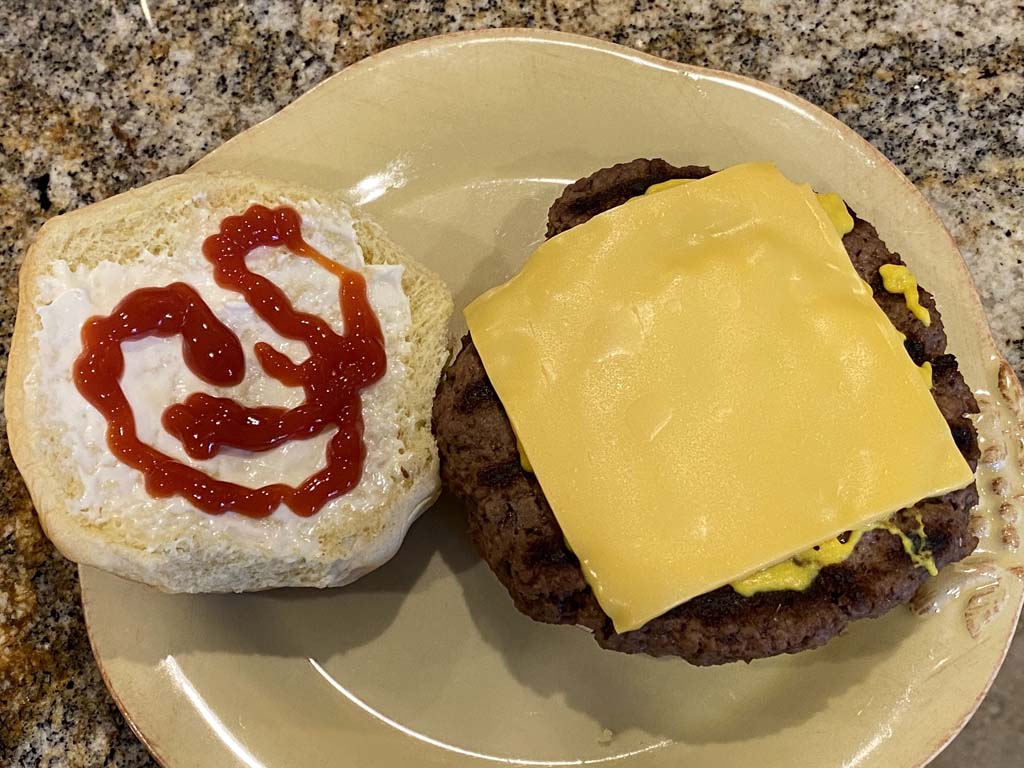 Impossible Burger on a bun with cheese