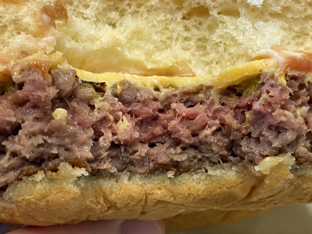 Bite view of the Impossible Burger